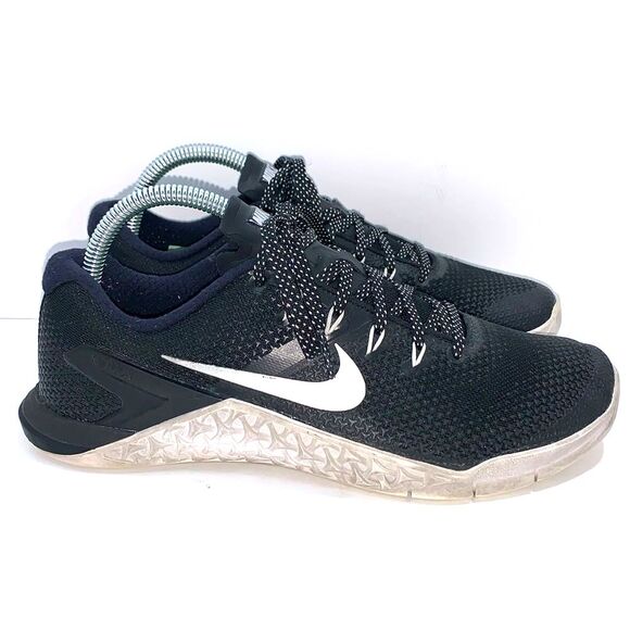 Nike Shoes - Nike Metcon 4 Black women's size 8.5 black white and silver